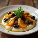 Berenjenas de almagro caseras servidas en un plato, ideales para compartir.