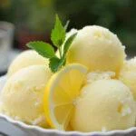Delicious sorbete de limon al cava served in a bowl, perfect for a refreshing summer treat.